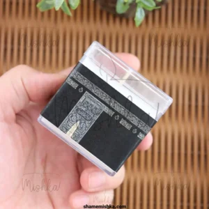 عکس شاخص محصول شمع کعبه در دست